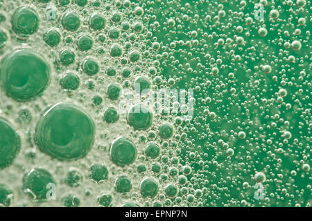 Macro Oxygen bubbles in water on a green background,  concept such as ecology and other your successful projects Stock Photo