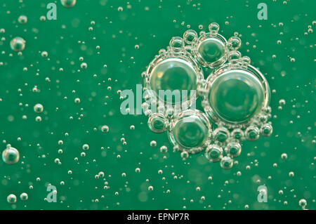 Macro Oxygen bubbles in water on a green background,  concept such as ecology and other your successful projects Stock Photo