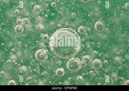 Macro Oxygen bubbles in water on a green background,  concept such as ecology and other your successful projects Stock Photo