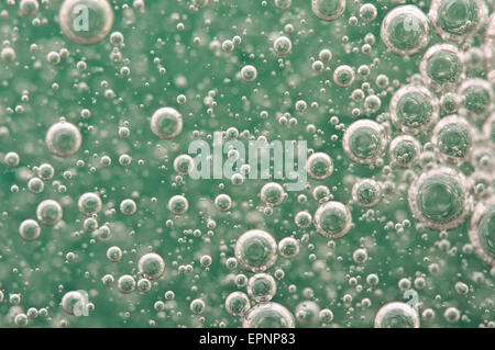 Macro Oxygen bubbles in water on a green background,  concept such as ecology and other your successful projects Stock Photo