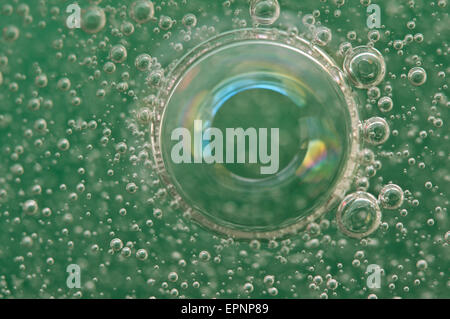 Macro Oxygen bubbles in water on a green background,  concept such as ecology and other your successful projects Stock Photo