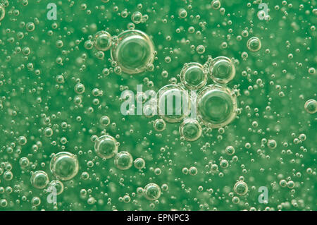 Macro Oxygen bubbles in water on a green background,  concept such as ecology and other your successful projects Stock Photo