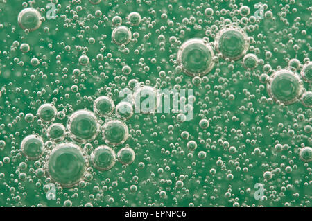 Macro Oxygen bubbles in water on a green background,  concept such as ecology and other your successful projects Stock Photo