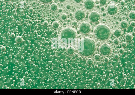 Macro Oxygen bubbles in water on a green background,  concept such as ecology and other your successful projects Stock Photo