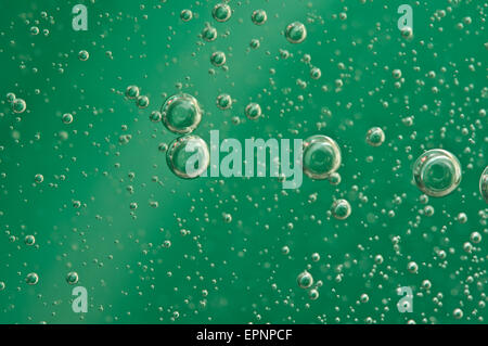 Macro Oxygen bubbles in water on a green background,  concept such as ecology and other your successful projects Stock Photo