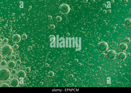 Macro Oxygen bubbles in water on a green background,  concept such as ecology and other your successful projects Stock Photo