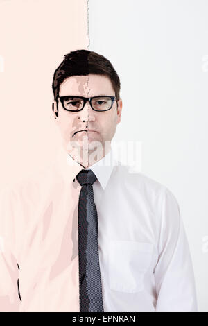 Portrait of serious businessman with two sides. One half of the image shows the man as a cartoon. Conceptual image of office Stock Photo