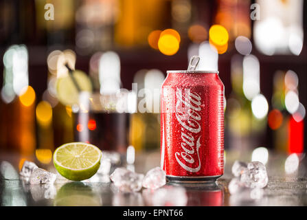 Prague, CZECH REPUBLIC - MAY 11, 2015 : Can of Coca-Cola on ice cubes. Coca-Cola is the one of the worlds favourite soft drinks. Stock Photo