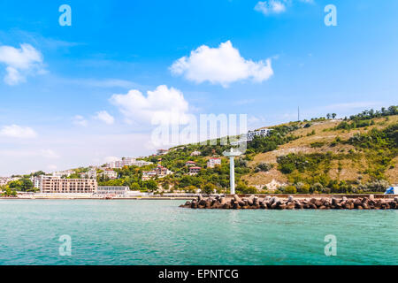 Landscape of Kavarna, coastal town and seaside resort in northeastern Bulgaria, Black Sea coast. Entrance to the port with white Stock Photo