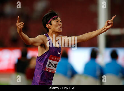 (150520) -- BEIJING, May 20, 2015(Xinhua) -- Zhang Guowei of China jubilates after crossing 2.34m during Men's High Jump Final of 2015 IAAF World Challenge at National Stadium (Birds Nest) in Beijing, China on May 20, 2015. Zhang claimed the title with 2.34 metres. (Xinhua/Wang Lili) Stock Photo