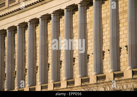 WASHINGTON DC, United States — The southern facade of the Robert F. Kennedy Department of Justice Building faces Constitution Avenue. The neoclassical structure, completed in 1935, serves as the headquarters of the United States Department of Justice. The building's exterior features distinctive Art Deco elements and sculptural details. Stock Photo