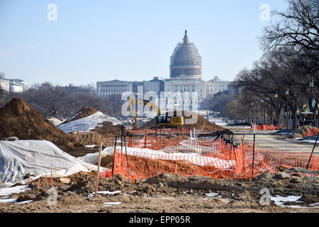 WASHINGTON DC, United States — Renovations on a section of the eastern end of the National Mall in Washington DC, with the dome of the U.S. Capitol Building in the background covered in scaffolding as it undergoes its own repairs. Stock Photo