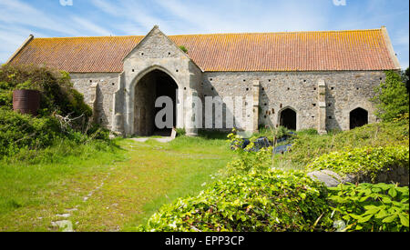 Fine medieval tithe barn at Woodspring Priory near Sand Point in Somerset UK Stock Photo