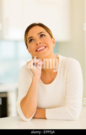 happy young woman looking up Stock Photo