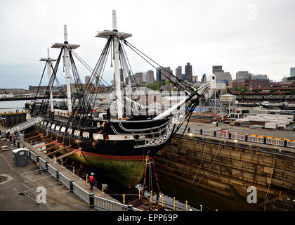 USS Constitution is moved into dry dock for the first time in 19-years in the Charlestown Navy Yard for a multi-year restoration project May 19, 2015 in Charlestown, Massachusetts. Stock Photo