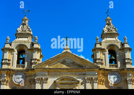 Facade of the St. Paul's Cathedral with two clocks, Mdina, also Città Vecchia or Città Notabile, Malta Stock Photo