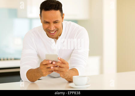 handsome middle aged man using smart phone Stock Photo