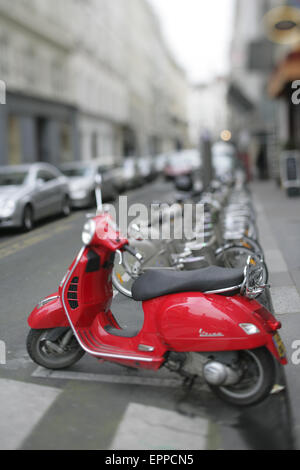 A red scooter in Paris, France Stock Photo