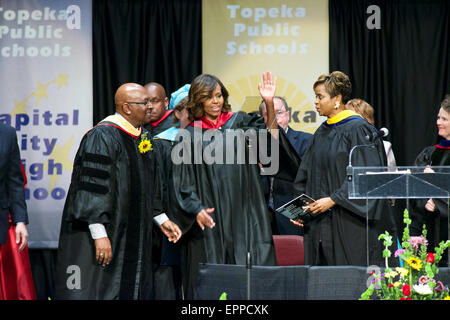 Mrs. Michelle Obama delvers her address to the graduating class of 2014 of all 4 local Topeka High Schools. Stock Photo