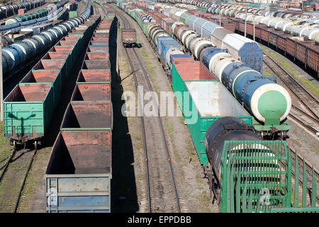 big railway cargo station junction with a lot of trains and track lines Stock Photo