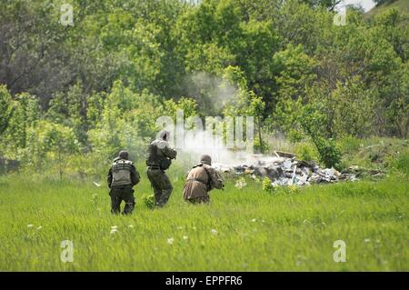 Donetsk, Ukraine. 19th May, 2015. Foreign volunteer fighters fighting for the D.N.R. Donetsk People's Republic took part in a military exercise which aimed to improve their combat and tactical skills. Foreigners including those from USA, France, Spain, Italy, Brazil and Serbia is known to be taking part in the conflict in eastern Ukraine and fighting for the Donetsk people's army. © Geovien So/Pacific Press/Alamy Live News Stock Photo