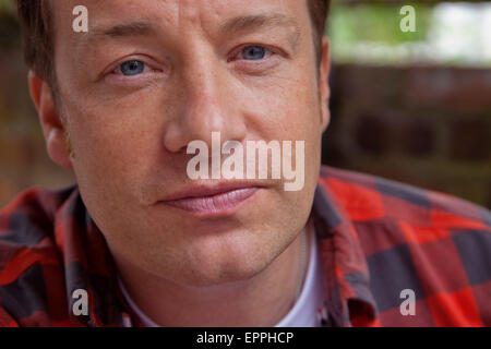 London, Britain. 15th May, 2015. Jamie Oliver, British chef, TV host and restaurateur, poses at Rhyl Primary School in London, Britain, 15 May 2015. Photo: David Sandison/dpa/Alamy Live News Stock Photo