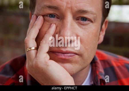 London, Britain. 15th May, 2015. Jamie Oliver, British chef, TV host and restaurateur, poses at Rhyl Primary School in London, Britain, 15 May 2015. Photo: David Sandison/dpa/Alamy Live News Stock Photo