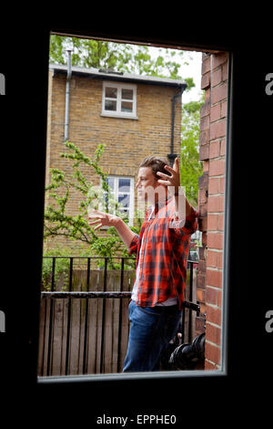 London, Britain. 15th May, 2015. Jamie Oliver, British chef, TV host and restaurateur, poses at Rhyl Primary School in London, Britain, 15 May 2015. Photo: David Sandison/dpa/Alamy Live News Stock Photo