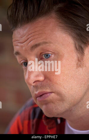 London, Britain. 15th May, 2015. Jamie Oliver, British chef, TV host and restaurateur, poses at Rhyl Primary School in London, Britain, 15 May 2015. Photo: David Sandison/dpa/Alamy Live News Stock Photo