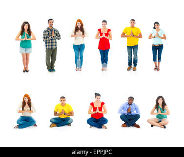 Young People Standing And Sitting Whilst Placing Their Two Hands Together Stock Photo