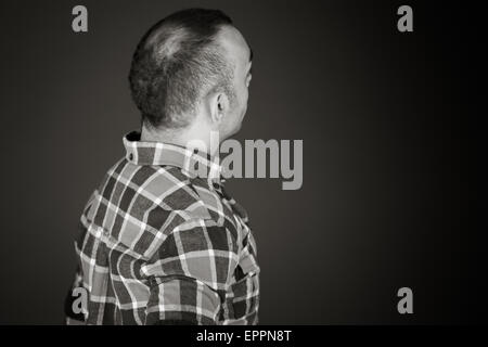 Model in studio isolated on plain grey background Stock Photo