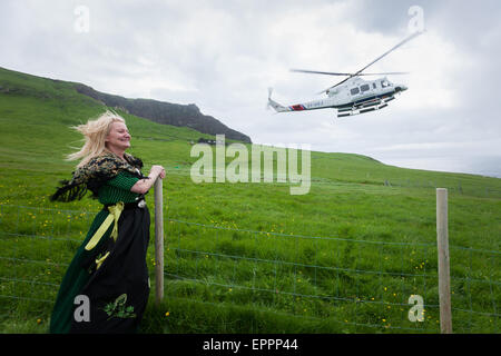 Helicopter landing in Mykines, Faroe Islands Stock Photo