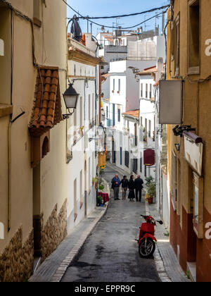 Narrow medieval street in Old Sitges, historical resort-city close to Barcelona in Spain Stock Photo