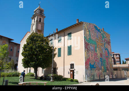 The Pisa's Mural (1989) by Keith Haring. Theme of peace and harmony in the world - on the south wall of the Church of St Anthony Stock Photo