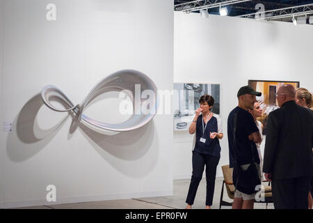 Florida Miami Art Basel international fair exhibition modern contemporary paintings pictures wall sculptures guests Stock Photo