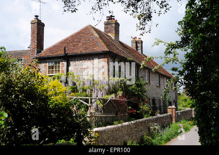 Quaint flint cottages in the village of Rodmell and civil parish in the Lewes District of East Sussex, England UK Stock Photo