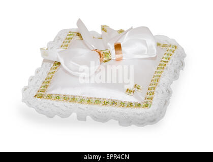 Two wedding rings laying on pad over white Stock Photo
