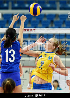 Tianjin, China. 21st May, 2015. Lyudmila Issayeva (R) of Kazakhstan competes during the group D match against the Philippines at the 2015 Asian Women's Volleyball Championship in Tianjin, north China, May 21, 2015. Kazakhstan won 3-0. © Zhang Chenlin/Xinhua/Alamy Live News Stock Photo