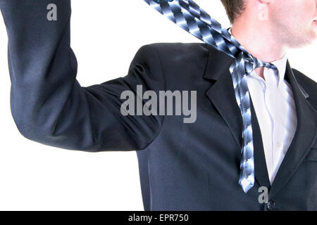 Businessman Pulls tie Choking Himself. Isolated Stock Photo