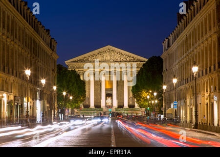 Car light-trails below Eglise Sainte-Marie-Madeleine near Place de la Concorde, Paris, France Stock Photo