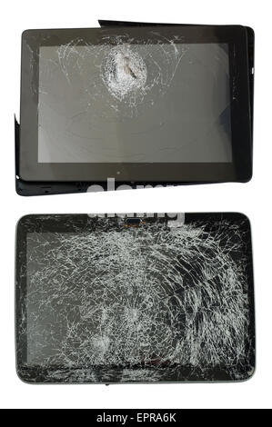 Couple of personal electronic gadgets was shot from an air gun. Isolated Stock Photo