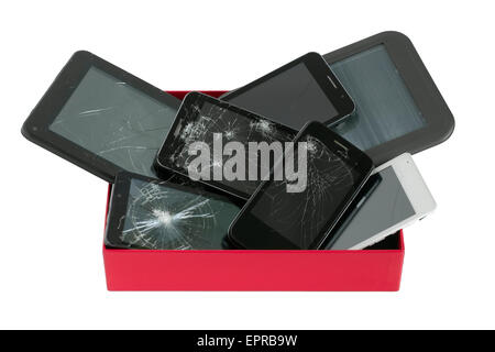 Heap of broken  personal no name mass production electronic gadgets in red paper box. Isolated with patch Stock Photo