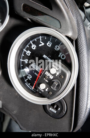 Large rev counter fitted to a modified car Stock Photo