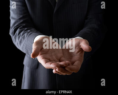 Two reaching out hands close-up composition Stock Photo