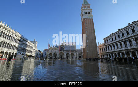 VENICE, VE, ITALY - January 31, 2015:Saint Mark's Basilica and campanile in the high tide in St. Mark's square under water Stock Photo