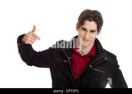 Model isolated on plain background in studio pointing Stock Photo