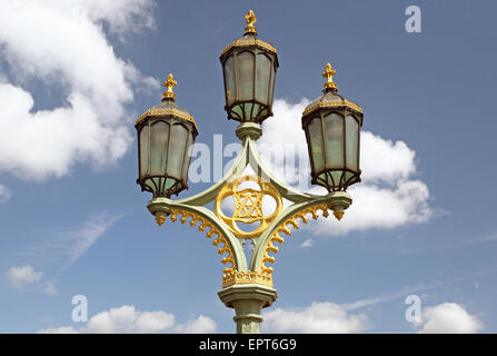 Ornate lamppost on Westminster Bridge, London - with initials of Victoria and Albert Stock Photo