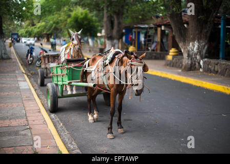 The lakefront along Lago Nicaragua next to Granada. Centro Turistico is a 2KM stretch of lakefront with parks, walkways, picnic areas, and restaurants. But it has evidently lacked funding for upkeep since opening. Stock Photo