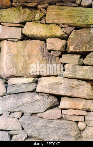one old wall made of stone and hand made Stock Photo