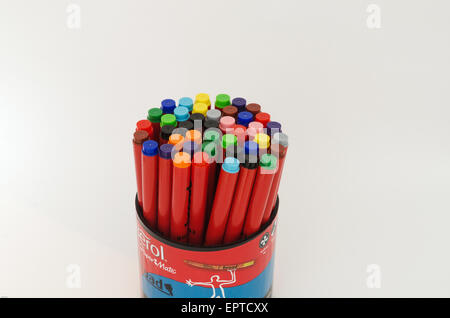one cup with many coloring pencils redy to paint on a paper Stock Photo
